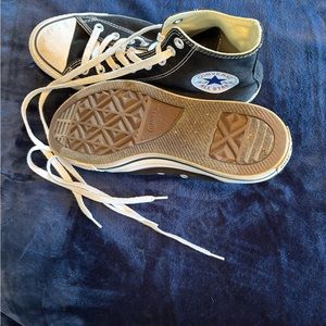 Lightly worn black high top converse